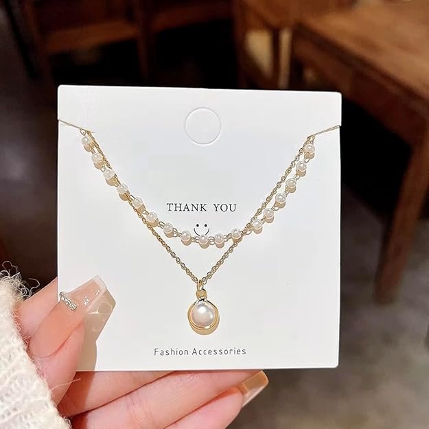 Gold Pearl Double Layer Necklace with Elegant Pearl Drop Pendant and Layered Chain Design