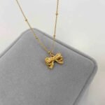 Gold Simple Bow Pendant Necklace with Elegant Minimal Bow Design and Gold Plated Finish