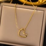 Gold Whisper Open Heart Necklace with Hollow Heart Pendant in Gold Plated Alloy Finish