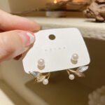 Korean Shimmery Petals Pearl Stud Earrings with floral design